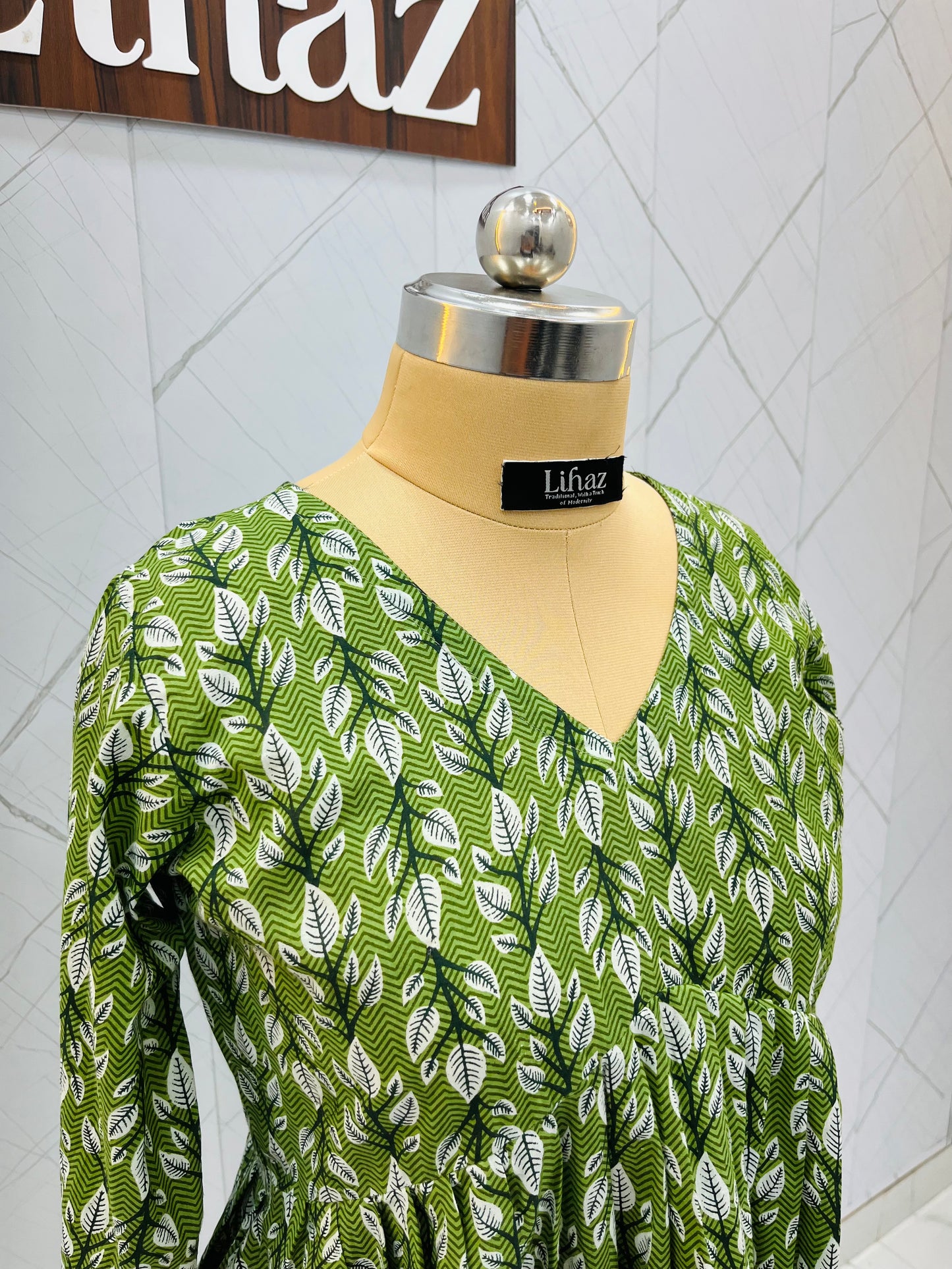 Green Peplum Top